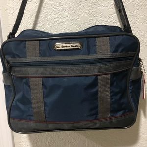 American Tourister travel bag.  Approximate size 11 x 14 x 5.